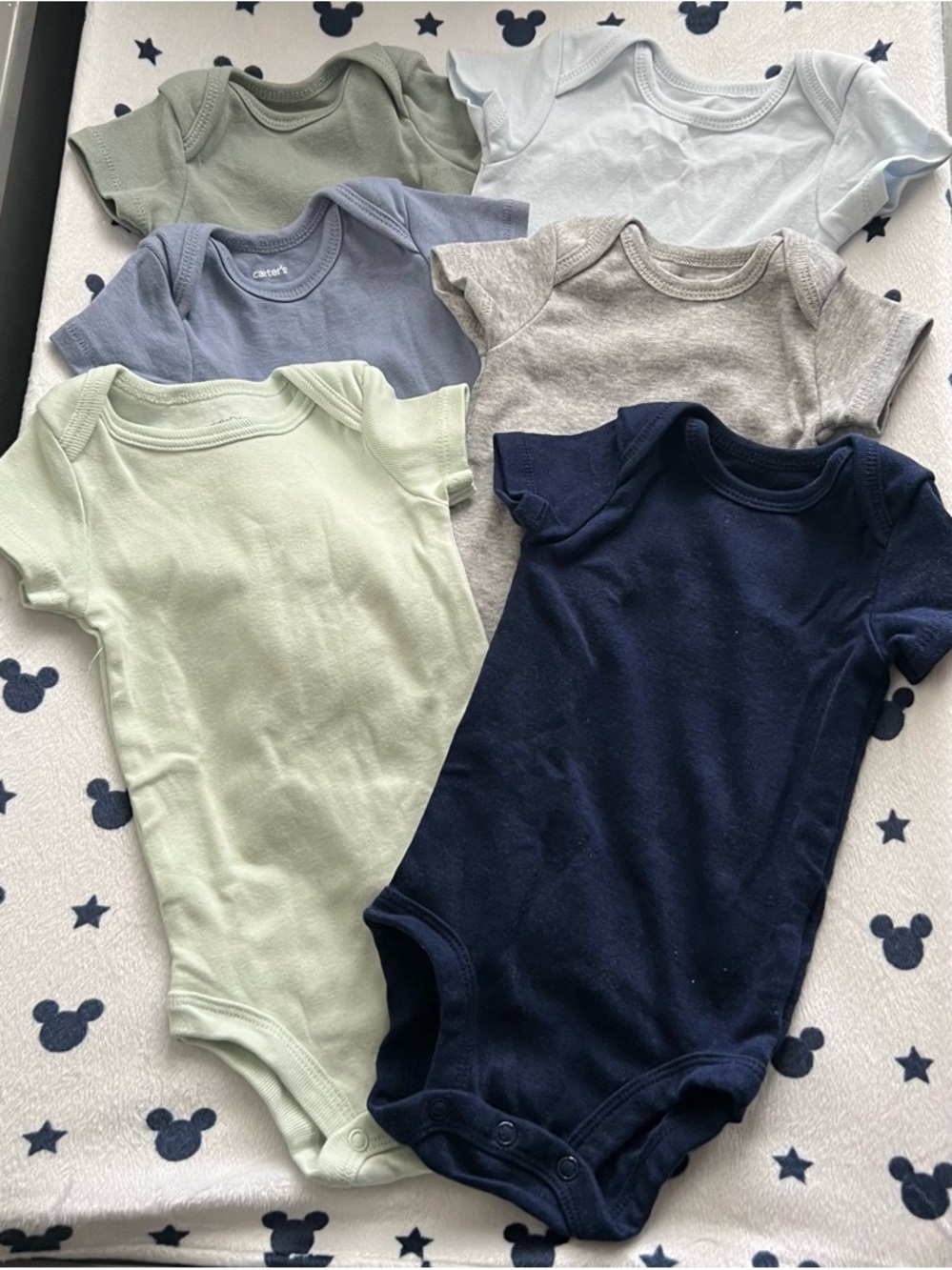 5 Cater’s & 1 Swaddle designs Baby Onesies